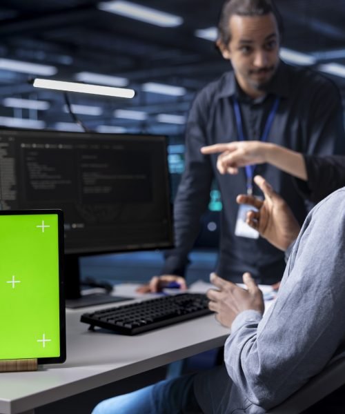 multiethnic-team-using-green-screen-tablet-to-over-MVKF9J9.jpg
